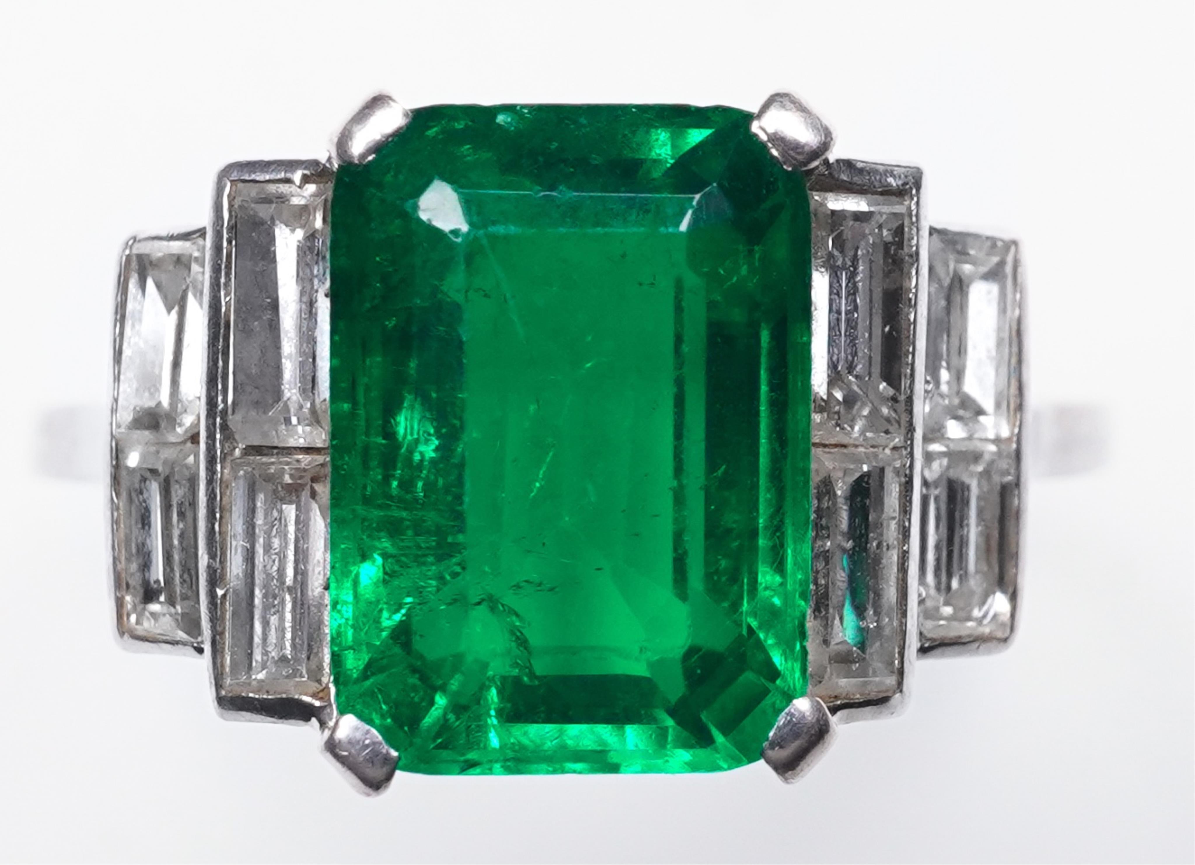 A fine Art Deco emerald and diamond ring, circa 1930